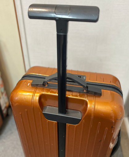 リモワ 伸縮ハンドルの修理事例(純正品部分修理) 修理前
